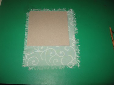 using the chipboard template to mark the swatches