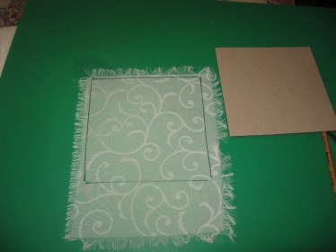 using the chipboard template to mark the swatches. Outline with marker first, then cut inside the line 